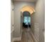 Elegant hallway with arched entryway and views into living area at 205 Hazard St, Orlando, FL 32804