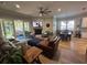 Bright living room featuring hardwood floors, sliding glass doors, and fireplace at 205 Hazard St, Orlando, FL 32804