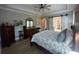 Serene main bedroom with a bed, dresser, and sliding doors to a closet at 205 Hazard St, Orlando, FL 32804