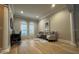 Spacious home office with large windows, seating, and natural light at 205 Hazard St, Orlando, FL 32804