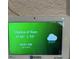 Smart home control panel displays current weather conditions at 205 Hazard St, Orlando, FL 32804