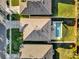 Aerial view of a house and private pool in a residential area at 211 Lynn St, Oviedo, FL 32765