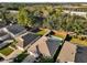 Aerial view of a house with a pool and surrounding neighborhood at 211 Lynn St, Oviedo, FL 32765