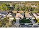 Aerial view of house with pool in residential neighborhood at 211 Lynn St, Oviedo, FL 32765