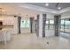 Bright dining area with large windows and access to a patio at 240 Blue Starfish Pl, Daytona Beach, FL 32124