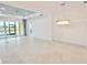 Spacious dining room with large windows and a chandelier at 240 Blue Starfish Pl, Daytona Beach, FL 32124