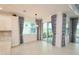 Spacious dining area with a stylish chandelier and adjacent to kitchen at 240 Blue Starfish Pl, Daytona Beach, FL 32124