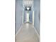 Light blue walls and a tile floor highlight this home's entryway at 240 Blue Starfish Pl, Daytona Beach, FL 32124