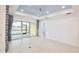 Bright Gathering room featuring tiled floors and sliding glass doors leading to a patio at 240 Blue Starfish Pl, Daytona Beach, FL 32124