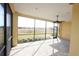 Screened patio overlooking a tranquil landscape at 240 Blue Starfish Pl, Daytona Beach, FL 32124