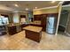 Well-equipped kitchen with stainless steel appliances, island, and plenty of storage at 2544 Ashville Ave, The Villages, FL 32162