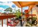 Relaxing balcony with table and chairs, overlooking parking area at 2858 N Powers Dr # 123, Orlando, FL 32818