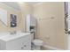 Bathroom featuring a white vanity, oval mirror, and neutral wall color at 2874 Pewter Mist Ct, Oviedo, FL 32765