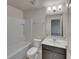 Bathroom with tub, toilet and vanity at 2943 Top Water Way, Kissimmee, FL 34746