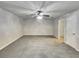 Simple bedroom with carpet flooring and ceiling fan at 2943 Top Water Way, Kissimmee, FL 34746