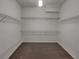 Large walk-in closet with wire shelving at 2943 Top Water Way, Kissimmee, FL 34746