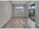Bright dining room with sliding glass doors to backyard at 2943 Top Water Way, Kissimmee, FL 34746