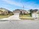 Single-story house with attached garage and manicured lawn at 2943 Top Water Way, Kissimmee, FL 34746