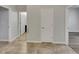 Hallway with tile floors and access to rooms at 2943 Top Water Way, Kissimmee, FL 34746