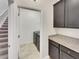 Laundry room with washer, dryer, and cabinets at 2943 Top Water Way, Kissimmee, FL 34746
