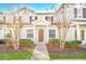 Inviting exterior of a two-story home with landscaping and walkway at 2956 Lucayan Harbour Cir # 107, Kissimmee, FL 34746