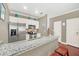 Modern kitchen features stainless steel appliances and granite countertops at 2956 Lucayan Harbour Cir # 107, Kissimmee, FL 34746