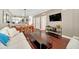 Living room with dark hardwood floors and a modern coffee table at 2956 Lucayan Harbour Cir # 107, Kissimmee, FL 34746