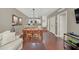 Bright living room with hardwood floors and a dining area at 2956 Lucayan Harbour Cir # 107, Kissimmee, FL 34746
