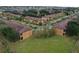 Aerial view of a neighborhood with multiple townhouses at 3428 Calabria Ave, Davenport, FL 33897