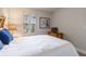 Serene bedroom featuring a full-size bed and a window with plantation shutters at 3428 Calabria Ave, Davenport, FL 33897