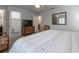 Primary bedroom with king bed, sitting area, and TV at 3428 Calabria Ave, Davenport, FL 33897