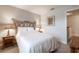 Bright bedroom featuring a bamboo bed frame and artwork at 3428 Calabria Ave, Davenport, FL 33897