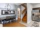 Dining area with wooden stairs and kitchen visible at 3428 Calabria Ave, Davenport, FL 33897
