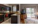 Kitchen with stainless steel appliances and granite countertops at 3428 Calabria Ave, Davenport, FL 33897