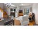 Open living space with kitchen, dining area, and stairs at 3428 Calabria Ave, Davenport, FL 33897
