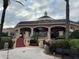 Exterior of the resort restaurant with beautiful architecture and landscaping at 3428 Calabria Ave, Davenport, FL 33897