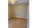 Tan bedroom with wood-look flooring at 371 Lexingdale Dr, Orlando, FL 32828