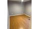 Grey bedroom with wood-look flooring at 371 Lexingdale Dr, Orlando, FL 32828