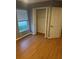 Bedroom with a double-door closet and wire shelving at 371 Lexingdale Dr, Orlando, FL 32828