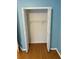 Bedroom with a double-door closet with wire shelving at 371 Lexingdale Dr, Orlando, FL 32828