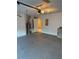 Garage with extra storage cabinets and water heater at 371 Lexingdale Dr, Orlando, FL 32828