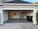 Attached garage with ample space for storage at 371 Lexingdale Dr, Orlando, FL 32828