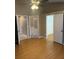 Spacious main bedroom with wood flooring and ceiling fan at 371 Lexingdale Dr, Orlando, FL 32828