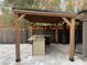 Outdoor kitchen with granite countertop and pergola at 371 Lexingdale Dr, Orlando, FL 32828