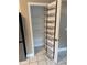 Walk-in pantry with wire shelving and over-the-door organizer at 371 Lexingdale Dr, Orlando, FL 32828