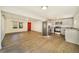 Open concept kitchen with stainless steel appliances and granite countertops at 4935 Sand Mountain Loop Rd, Auburndale, FL 33823