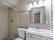 Clean bathroom with a shower, toilet and vanity at 5711 Bolling Dr, Orlando, FL 32808