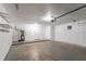 Spacious garage with extra storage and a door to outside at 5711 Bolling Dr, Orlando, FL 32808