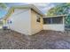 Side view of house showcasing exterior details at 5711 Bolling Dr, Orlando, FL 32808