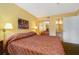 King-size bed, mirrored closet, ensuite bathroom at 6403 Parc Corniche Dr # 4309, Orlando, FL 32821